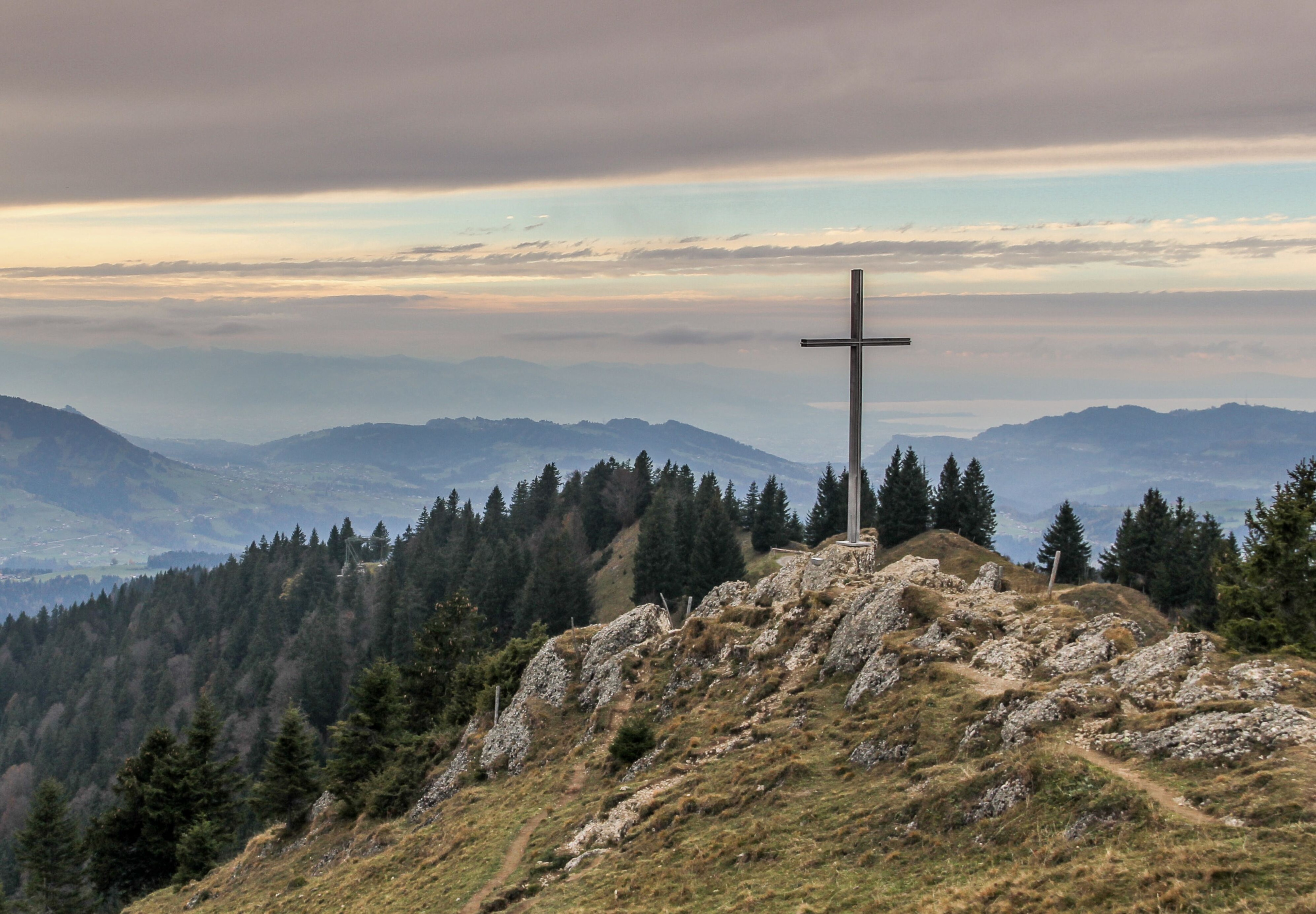 image of a cross on a mountain